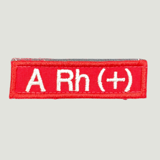 A Rh + Ünvan kokartı